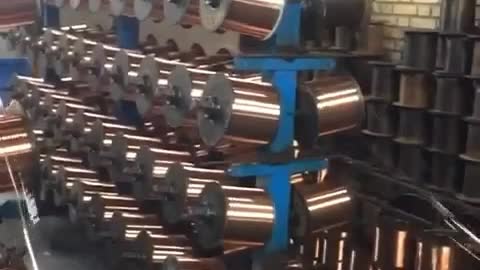 Wire and cable weaving stage in Kaman cable factory