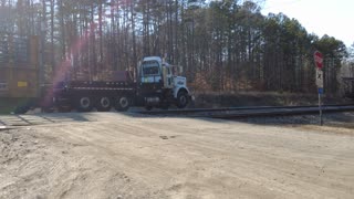 Truck Pulling A Work Train