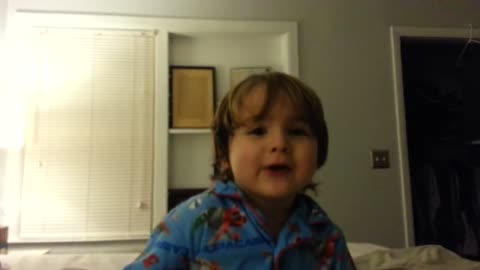 2 year old sings santa clause is coming to town Super cute