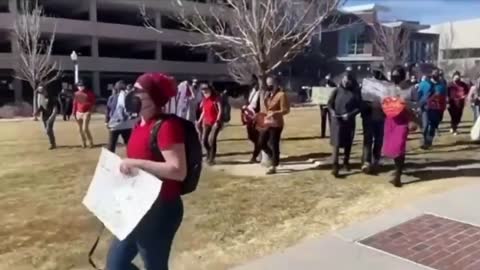 Meanwhile, on the other side of sanity: Reinstate mask mandates rally. I don't get one thing: If they want to wear masks - wear them! But why force other people to do so?