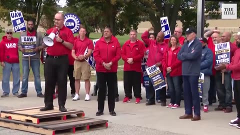 Biden Marches With Striking UAW Members