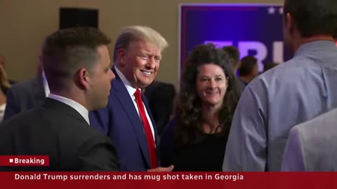 Trump surrenders in Georgia, has mug shot taken