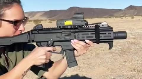 Hot Israeli girl shoots suppressed CZ Scorpion