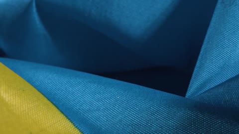 Tracking Shot of a Ruffled Ukrainian Flag