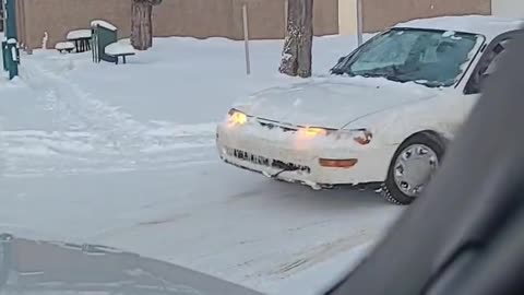 Car Crosses Despite Missing One Wheel