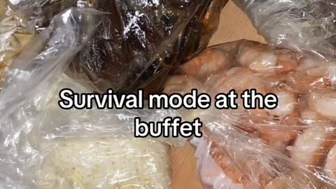 Guy takes food home from Buffet