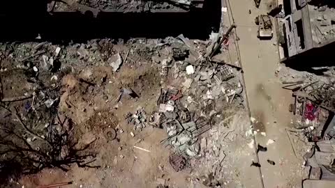 Drone view: children play in Gaza's ruins