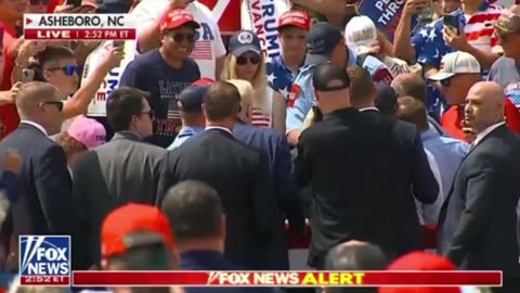 BREAKING: A woman just fainted in the stands at the President Trump rally