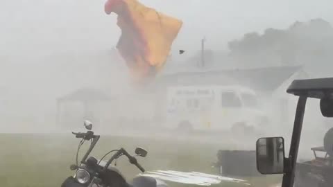 Strong thunderstorm winds destroy outdoor tents in Hillsboro, Alabama