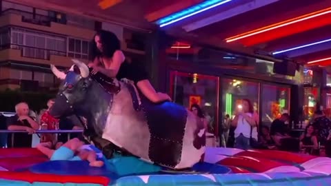 GIRLS Bull riding challenge in Benidorm_ mechanical Bull riding