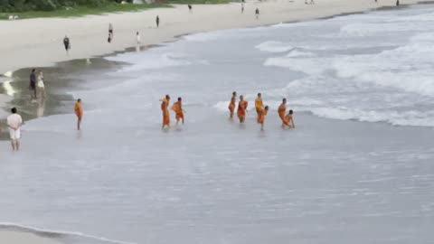 Little Buddhist MonksWade into the Waters off Nai Harn Beach, Phuket