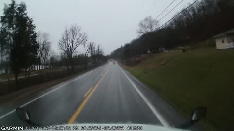 Driver Passing a Semi Has a Close Call