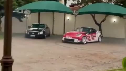 Nissan 350z drifting on the garden