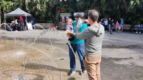 Walter playing with fountain VID_20231229_123602