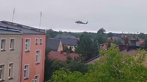 Police helicopter in action Poland. Evacuation of people who did not want to