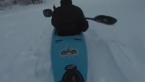 Snow kayaking after metal detecting