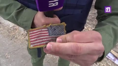 Ukraine War - A Chevron with an American flag on the street in Rubizhne was found