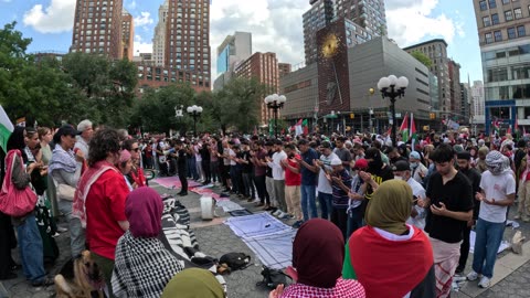 Muslims pray at the rally: "FLOOD New York City FOR GAZA."