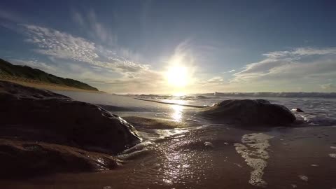 Waves Crashing onto The Beach