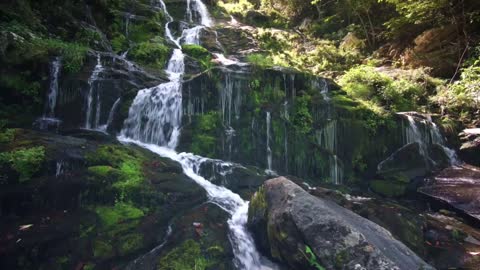 Beautiful Water fall rocky hillside