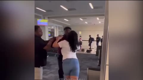 Spirit Airline employee punches a woman in the back of the head at Dallas -Ft Worth airport 🤬