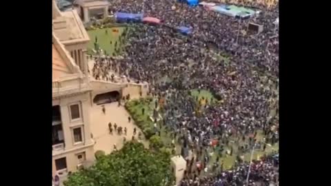 Sri Lanka has fallen as the people swarm the presidential Palace..