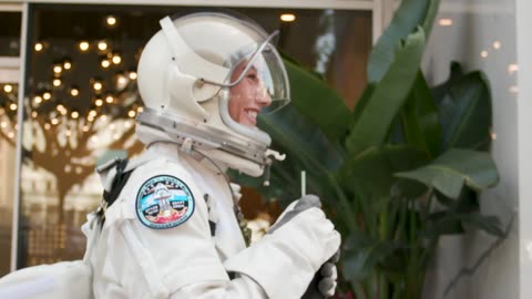 Woman Wearing Astronaut Costume