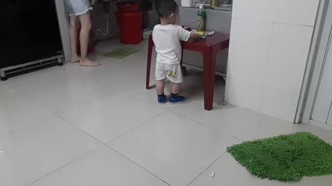 Baby learning to walk verry funny