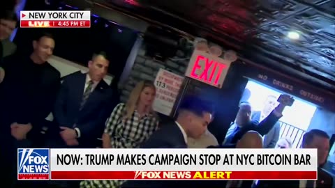 Donald Trump uses Bitcoin to pay at a bar in New York.