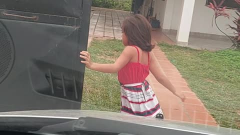 Independent Daughter Uses Whole Body To Open Gate