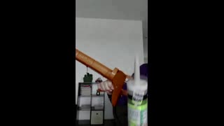 How to use a caulk gun