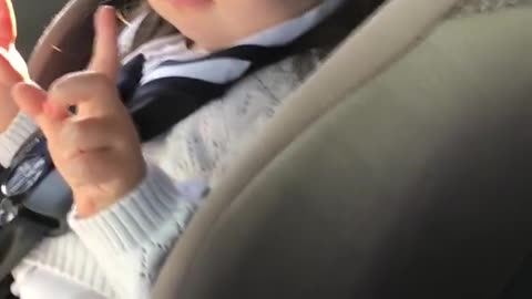 Toddler waiting for the beat drop