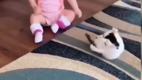 See how this boy is playing with his cat