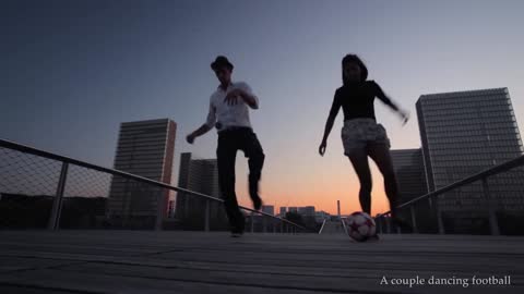 A couple dancing soccer