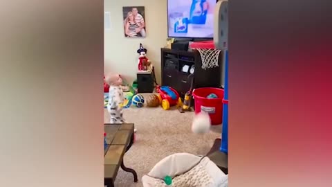 Baby plays basketball, probably the next Michael Jordan