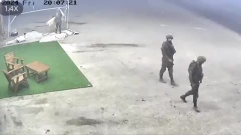 CCTV footage captured an IOF soldier looting a carpet from a shop