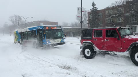 Team of Trucks Saves a Bus