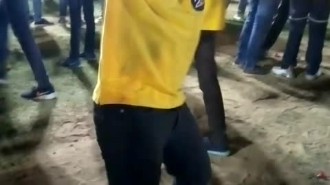 School boy dancing in cultural way .