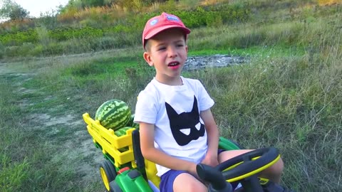 Darius Rides on Tractor Kids Pretend Play riding on Truck Toys gathering watermelon