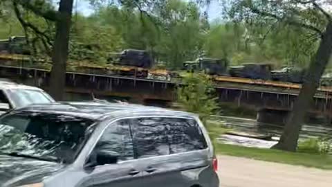 Southbound military train leaving Chicago area