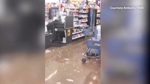 Hail falls through Walmart skylight in storm