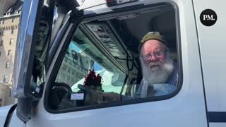 A Freedom Convoy trucker gives his thoughts as police surround his vehicle