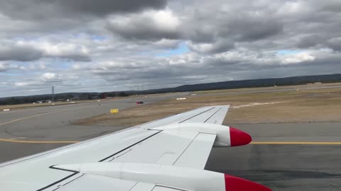 Fokker 100 pilot retracting flaps before take off Perth Airport YPPH