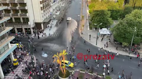 Police Use Water Canons Against anti-vaccine passport protesters in Central Athens’ Syntagma Square.