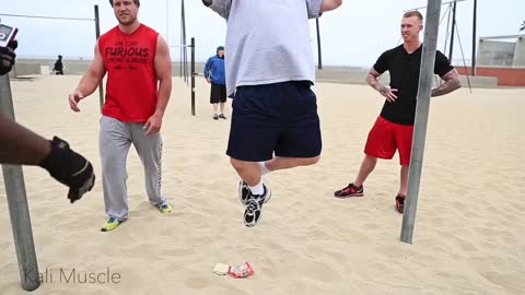 Kali Muscle instructing Furious Pete and Big J on how to achieve a muscle up.