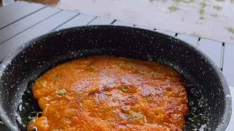 Kimchi pancake, a traditional Korean food you eat on a rainy day.