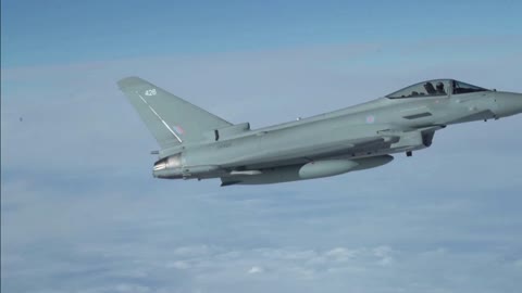 F-16 And Eurofighter Typhoon escorting B-52