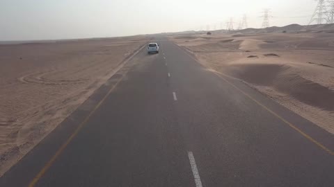 Laxury car driving dessert highway