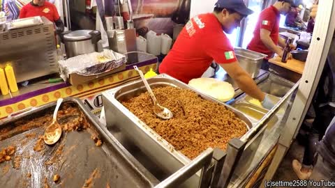 Mexico Street Food. Preparing Lots of Tacos and Burritos