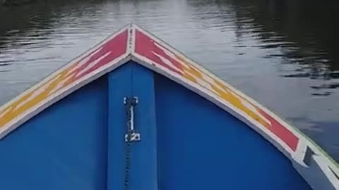 Small wooden boat tour.